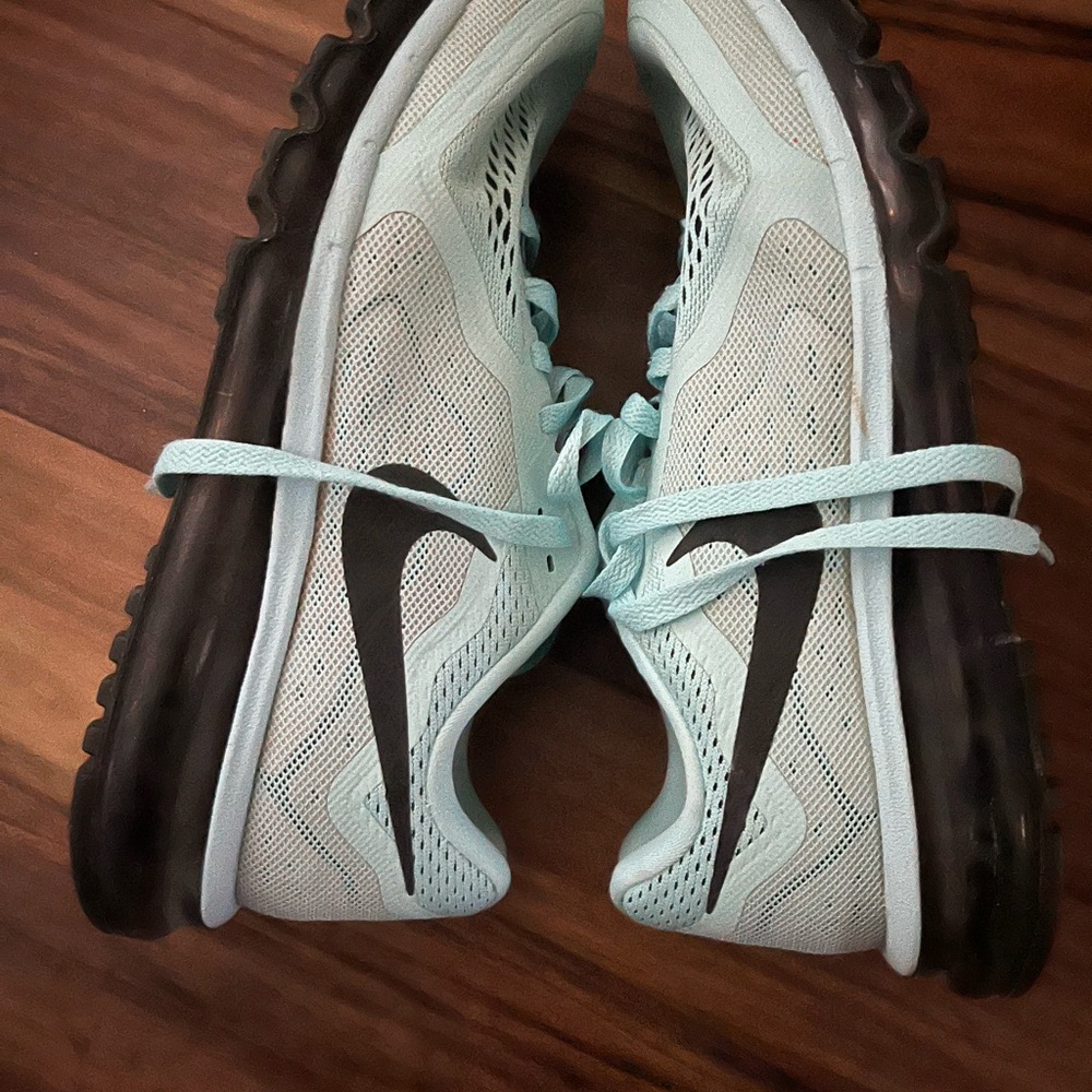 Nike Women's light teal Running Shoes